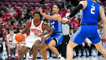 Nov 1, 2022; Columbus, Ohio, USA; Ohio State University forward Brice Sensabaugh (10) contests the ball with Chaminade University forward Kobe Young (24) during the second half of the division I basketball game at Value City Arena on Tuesday night. Mandatory Credit: Joseph Scheller-The Columbus DispatchBasketball Ceb Mbk Chaminade Chaminade At Ohio State