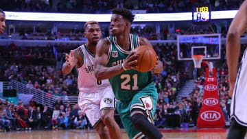 Mar 17, 2016; Chicago, IL, USA; Chicago Bulls guard Jimmy Butler (21) drives past Brooklyn Nets guard Shane Larkin (0) during the second half at the United Center. Chicago won 118-102. Mandatory Credit: Dennis Wierzbicki-USA TODAY Sports