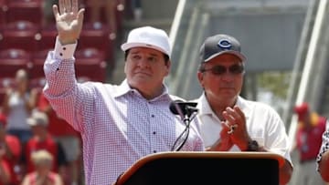 Jun 26, 2016; Cincinnati, OH, USA; Former Cincinnati Reds player Pete Rose (left) waves to the crowd during his number retirement ceremony prior to a game with the San Diego Padres at Great American Ball Park. Mandatory Credit: David Kohl-USA TODAY Sports