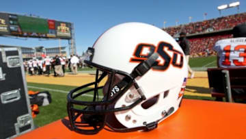 Oct 26, 2013; Ames, IA, USA; An Oklahoma State Cowboys helmet on the sidelines during the third quarter against the Iowa State Cyclones at Jack Trice Stadium. Oklahoma State defeated Iowa State 58-27. Mandatory Credit: Brace Hemmelgarn-USA TODAY Sports
