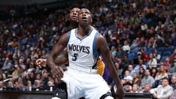 MINNEAPOLIS, MN - MARCH 30: Gorgui Dieng #5 of the Minnesota Timberwolves boxes out against the Los Angeles Lakers on March 30, 2017 at Target Center in Minneapolis, Minnesota. NOTE TO USER: User expressly acknowledges and agrees that, by downloading and or using this Photograph, user is consenting to the terms and conditions of the Getty Images License Agreement. Mandatory Copyright Notice: Copyright 2017 NBAE (