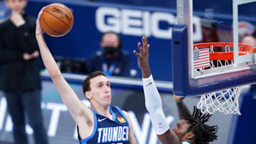 OKC Thunder forward Aleksej Pokusevski (17) goes to the basket as Boston Celtics center Robert Williams III (44): Alonzo Adams-USA TODAY Sports