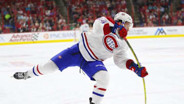 Nov 18, 2016; Raleigh, NC, USA; Montreal Canadiens forward Charles Hudon (54) takes a third espied shot against the Carolina Hurricanes at PNC Arena. The Carolina Hurricanes defeated the Montreal Canadiens 3-2. Mandatory Credit: James Guillory-USA TODAY Sports