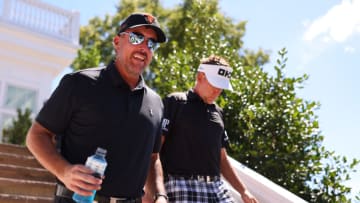BEDMINSTER, NEW JERSEY - JULY 30: (L-R) Team Captain Phil Mickelson of Hy Flyers GC and Ian Poulter of Majesticks GC walk to the course during day two of the LIV Golf Invitational - Bedminster at Trump National Golf Club Bedminster on July 30, 2022 in Bedminster, New Jersey. (Photo by Chris Trotman/LIV Golf via Getty Images)