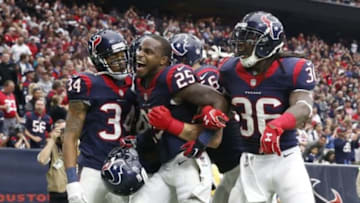 Dec 21, 2014; Houston, TX, USA; Houston Texans cornerback Kareem Jackson (25) celebrates his interception with teammates during the game against the Baltimore Ravens at NRG Stadium. Mandatory Credit: Kevin Jairaj-USA TODAY Sports