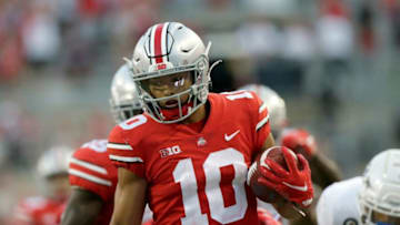 Ohio State Buckeyes wide receiver Jayden Ballard (10) runs for a touchdown during the second half of Saturday's NCAA Division I football game against the Tulsa Golden Hurricanes at Ohio Stadium in Columbus on September 18, 2021. Ohio State won the game 41-20.Osu21tlsa Bjp 1085