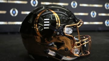 Jan 11, 2022; Indianapolis, Indiana, USA; A detailed view of College Football Playoff National Championship logo helmet at 2022 Indianapolis Host Committee press conference at the JW Marriott. Mandatory Credit: Kirby Lee-USA TODAY Sports