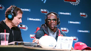 BLOOMINGTON, MN - FEBRUARY 01: SiriusXM radio host Chris "Mad Dog" Russo (L) and former NFL player Terrell Owens attend SiriusXM at Super Bowl LII Radio Row at the Mall of America on February 1, 2018 in Bloomington, Minnesota. (Photo by Cindy Ord/Getty Images for SiriusXM)