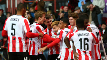 BRENTFORD, ENGLAND - JANUARY 04: Emiliano Marcondes of Brentford (C) celebrates with teammates after scoring his team's first goal during the FA Cup Third Round match between Brentford FC and Stoke City at Griffin Park on January 04, 2020 in Brentford, England. (Photo by Steve Bardens/Getty Images)