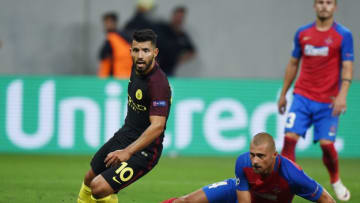 Sergio Aguero (L) of Manchester City vies for the ball with Gabriel Tamas of Steaua Bucharest during the UEFA Champions league first leg play-off football match between Steaua Bucharest and Manchester City at the National Arena stadium in Bucharest on August 16, 2016. / AFP / DANIEL MIHAILESCU (Photo credit should read DANIEL MIHAILESCU/AFP/Getty Images)