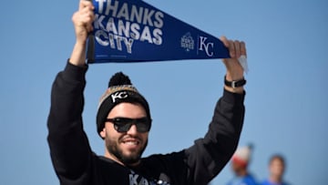 KANSAS CITY, MO -NOVERMBER 3: Eric Hosmer #35 of the Kansas City Royals holds up a pennant thanking fans during a parade to celebrate their World Series victory on November 3, 2015 in Kansas City, Missouri. (Photo by Ed Zurga/Getty Images)