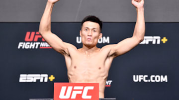 LAS VEGAS, NEVADA - JUNE 18: In this UFC handout, 'The Korean Zombie' Chan Sung Jung of South Korea poses on the scale during the UFC weigh-in at UFC APEX on June 18, 2021 in Las Vegas, Nevada. (Photo by Chris Unger/Zuffa LLC)