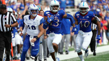 Cornerback Hasan Defense of Kansas football scores a touchdown. (Photo by Jamie Squire/Getty Images)