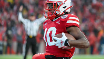 LINCOLN, NE - NOVEMBER 29: Wide receiver JD Spielman #10 of the Nebraska Cornhuskers scores against the Iowa Hawkeyes at Memorial Stadium on November 29, 2019 in Lincoln, Nebraska. (Photo by Steven Branscombe/Getty Images)