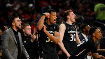 Cincinnati Bearcats forward Ody Oguama celebrates basket during game against Wichita State at Fifth Third Arena. The Enquirer.