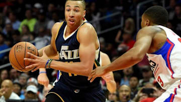 Oct 30, 2016; Los Angeles, CA, USA; Utah Jazz guard Dante Exum (11) drives to the basket against Los Angeles Clippers forward Wesley Johnson (33) in the second half of the game at Staples Center. Clippers won 88-75. Mandatory Credit: Jayne Kamin-Oncea-USA TODAY Sports