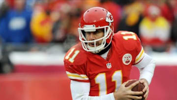 Dec 22, 2013; Kansas City, MO, USA; Kansas City Chiefs quarterback Alex Smith (11) runs the ball during the second half of the game against the Indianapolis Colts at Arrowhead Stadium. The Colts won 23-7. Mandatory Credit: Denny Medley-USA TODAY Sports