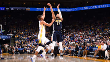 OAKLAND, CA - SEPTEMBER 30: Jamal Murray #27 of the Denver Nuggets shoots the ball during the game against the Golden State Warriors during a preseason game on September 30, 2017 at ORACLE Arena in Oakland, California. NOTE TO USER: User expressly acknowledges and agrees that, by downloading and or using this photograph, user is consenting to the terms and conditions of Getty Images License Agreement. Mandatory Copyright Notice: Copyright 2017 NBAE (Photo by Noah Graham/NBAE via Getty Images)