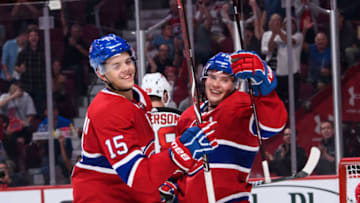 MONTREAL, QC - SEPTEMBER 17: Montreal Canadiens center Jesperi Kotkaniemi (15) and Montreal Canadiens left wing Artturi Lehkonen (62) celebrate Montreal Canadiens left wing Charles Hudon (54) goal during the third period of the NHL game between the New Jersey Devils and the Montreal Canadiens on September 17, 2018, at the Bell Centre in Montreal, QC (Photo by Vincent Ethier/Icon Sportswire via Getty Images)