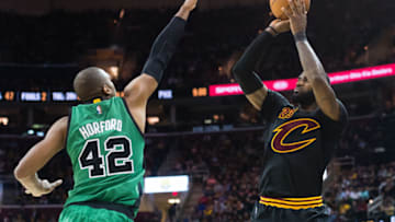 CLEVELAND, OH - DECEMBER 29: Al Horford #42 of the Boston Celtics tries to block LeBron James #23 of the Cleveland Cavaliers during the second half at Quicken Loans Arena on December 29, 2016 in Cleveland, Ohio. The Cavaliers defeated the Celtics 124-118. NOTE TO USER: User expressly acknowledges and agrees that, by downloading and/or using this photograph, user is consenting to the terms and conditions of the Getty Images License Agreement. Mandatory copyright notice. (Photo by Jason Miller/Getty Images)