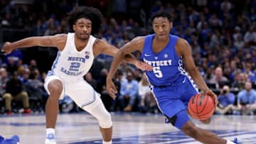 CHICAGO, ILLINOIS - DECEMBER 22: Immanuel Quickley #5 of the Kentucky Wildcats dribbles the ball while being guarded by Coby White #2 of the North Carolina Tar Heels in the first half during the CBS Sports Classic at the United Center on December 22, 2018 in Chicago, Illinois. (Photo by Dylan Buell/Getty Images)