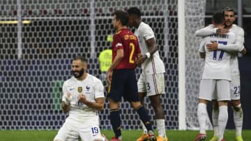 MILAN, ITALY, OCTOBER 10: Karim Benzema (L), of France, celebrates at the end of the UEFA Nations League football tournament final match between Spain and France at San Siro stadium in Milan, Italy, on October 10, 2021. France defeated Spain 2-1. (Photo by Isabella Bonotto/Anadolu Agency via Getty Images)
