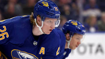 Apr 23, 2022; Buffalo, New York, USA; Buffalo Sabres defenseman Rasmus Dahlin (26) waits for a face-off during the first period against the New York Islanders at KeyBank Center. Mandatory Credit: Timothy T. Ludwig-USA TODAY Sports