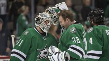 Jan 21, 2016; Dallas, TX, USA; Dallas Stars goalie Antti Niemi (31) and goalie Kari Lehtonen (32) celebrate the win over the Edmonton Oilers at the American Airlines Center. The Stars defeat the Oilers 3-2. Mandatory Credit: Jerome Miron-USA TODAY Sports