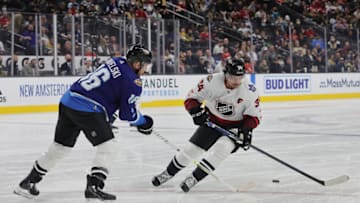 LAS VEGAS, NEVADA - FEBRUARY 05: Auston Matthews #34 of the Toronto Maple Leafs and Joe Pavelski #16 of the Dallas Stars battle for the puck during the game between the Atlantic Division and the Central Division during the 2022 Honda NHL All-Star Game at T-Mobile Arena on February 05, 2022 in Las Vegas, Nevada. (Photo by Ethan Miller/Getty Images)