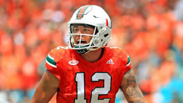 Miami quarterback Malik Rosier (12) at the line of scrimmage in the second quarter against Bethune-Cookman at Hard Rock Stadium in Miami on Saturday, Sept. 2, 2017. The host Hurricanes won, 41-13. (Al Diaz/Miami Herald/TNS via Getty Images)
