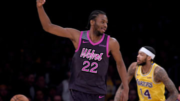 LOS ANGELES, CALIFORNIA - JANUARY 24: Andrew Wiggins #22 of the Minnesota Timberwolves reacts after his dunk in front of Brandon Ingram #14 of the Los Angeles Lakers during a 120-105 Wolves win at Staples Center on January 24, 2019 in Los Angeles, California. (Photo by Harry How/Getty Images)