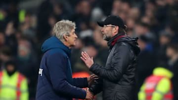 LONDON, ENGLAND - FEBRUARY 04: Manuel Pellegrini, Manager of West Ham United and Jurgen Klopp, Manager of Liverpool speak following their draw in the the Premier League match between West Ham United and Liverpool FC at London Stadium on February 04, 2019 in London, United Kingdom. (Photo by Catherine Ivill/Getty Images)