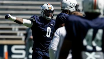 Auburn football linebacker Owen Pappoe (0) runs drills during an open football practice at Jordan-Hare Stadium in Auburn, Ala., on Saturday, March 20, 2021.