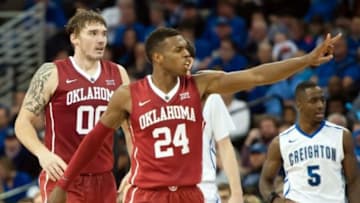 Nov 19, 2014; Omaha, NE, USA; Oklahoma Sooners guard Buddy Hield (24) signals the bench against the Creighton Bluejays at CenturyLink Center Omaha. Creighton defeated Oklahoma 65-63. Mandatory Credit: Steven Branscombe-USA TODAY Sports