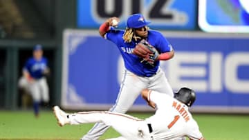 Vladimir Guerrero Jr. #27 of the Toronto Blue Jays forces out Richie Martin #1 of the Baltimore Orioles to start a double play in the ninth inning at Oriole Park at Camden Yards on August 1, 2019 in Baltimore, Maryland. (Photo by Greg Fiume/Getty Images)
