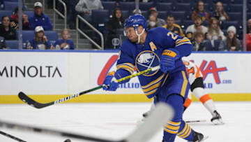 BUFFALO, NEW YORK - SEPTEMBER 27: Kyle Okposo #21 of the Buffalo Sabres shoots during the third period against the Philadelphia Flyers at KeyBank Center on September 27, 2022 in Buffalo, New York. (Photo by Joshua Bessex/Getty Images)