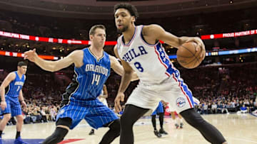 Feb 23, 2016; Philadelphia, PA, USA; Philadelphia 76ers center Jahlil Okafor (8) attempt to dribbles past the defense of Orlando Magic forward Jason Smith (14) during the second half at Wells Fargo Center. The Orlando Magic won 124-115. Mandatory Credit: Bill Streicher-USA TODAY Sports