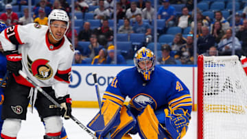 BUFFALO, NY - OCTOBER 13: Craig Anderson #41 of the Buffalo Sabres tends net as Mathieu Joseph #21 of the Ottawa Senators looks for a pass during the third period at KeyBank Center on October 13, 2022 in Buffalo, New York. (Photo by Kevin Hoffman/Getty Images)