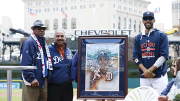 Apr 26, 2015; Detroit, MI, USA; Former Detroit Tiger Lou Whitaker (left) is presented with a water color painting to commemorate his 2015 Detroit Tigers African American Legacy Award by former Tiger Willie Horton and starting pitcher David Price (right) before the game against the Cleveland Indians at Comerica Park. Mandatory Credit: Rick Osentoski-USA TODAY Sports
