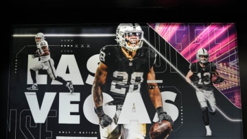 Feb 3, 2023; Las Vegas, NV, USA; Images of Las Vegas Raiders tight end Darren Waller (83), running back Josh Jacobs (28) and receiver Hunter Renfrow (13) at the Raider Image team store at Allegiant Stadium. Mandatory Credit: Kirby Lee-USA TODAY Sports