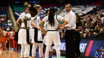 GREENSBORO, NC - MARCH 08: Louisville Cardinals head coach Jeff Walz talks to his team during a timeout during the ACC Women's basketball tournament between the Louisville Cardinals and the Clemson Tigers on March 8, 2019, at the Greensboro Coliseum Complex in Greensboro, NC. (Photo by William Howard/Icon Sportswire via Getty Images)