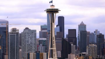 SEATTLE, WASHINGTON - JULY 23: A general view of the Seattle skyline as the Seattle Kraken team flag is hung from the Space Needle on July 23, 2020 in Seattle, Washington. The NHL revealed the franchise's new team name today. (Photo by Abbie Parr/Getty Images)
