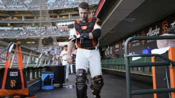 SAN FRANCISCO, CALIFORNIA - AUGUST 16: Buster Posey #28 of the San Francisco Giants prepares for the game against the New York Mets at Oracle Park on August 16, 2021 in San Francisco, California. (Photo by Thearon W. Henderson/Getty Images)