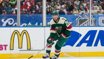 Feb 21, 2016; Minneapolis, MN, USA; Minnesota Wild forward Thomas Vanek (26) carries the puck during a Stadium Series hockey game at TCF Bank Stadium. The Minnesota Wild defeated the Chicago Blackhawks 6-1. Mandatory Credit: Brace Hemmelgarn-USA TODAY Sports