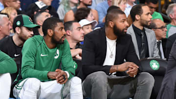 BOSTON, MA - OCTOBER 24: Kyrie Irving #11 and Marcus Morris #13 of the Boston Celtics looks on during the game against the New York Knicks on October 24, 2017 at the TD Garden in Boston, Massachusetts. NOTE TO USER: User expressly acknowledges and agrees that, by downloading and or using this photograph, User is consenting to the terms and conditions of the Getty Images License Agreement. Mandatory Copyright Notice: Copyright 2017 NBAE (Photo by Brian Babineau/NBAE via Getty Images)