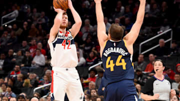 WASHINGTON, DC - JANUARY 12: Davis Bertans #42 of the Washington Wizards shoots in front of Bojan Bogdanovic #44 of the Utah Jazz during the game at Capital One Arena on January 12, 2020 in Washington, DC. NOTE TO USER: User expressly acknowledges and agrees that, by downloading and or using this photograph, User is consenting to the terms and conditions of the Getty Images License Agreement. (Photo by Will Newton/Getty Images)