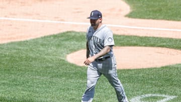 Jun 27, 2021; Chicago, Illinois, USA; Seattle Mariners relief pitcher Hector Santiago (57) is ejected from a baseball game against the Chicago White Sox after illegal substance was found in his glove during the fifth inning of the first game of a doubleheader at Guaranteed Rate Field. Mandatory Credit: Kamil Krzaczynski-USA TODAY Sports