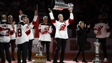 Former New Jersey Devil Scott Stevens (C) raises the Stanley Cup during the 2003 Championship 20th Anniversary Celebration Presented by Citizens before the first period between the New Jersey Devils and the Philadelphia Flyers at Prudential Center on February 25, 2023 in Newark, New Jersey. (Photo by Sarah Stier/Getty Images)