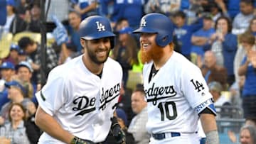 LOS ANGELES, CA - MAY 26: Chris Taylor #3 is greeted by Justin Turner #10 of the Los Angeles Dodgers after crossing the plate after hitting a solo home run in the first inning of the game against the San Diego Padres at Dodger Stadium on May 26, 2018 in Los Angeles, California. (Photo by Jayne Kamin-Oncea/Getty Images)