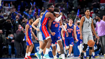 Hamidou Diallo #6 and Saddiq Bey #41 of the Detroit Pistons celebrate their win against the San Antonio Spurs at Little Caesars Arena on January 01, 2022 (Photo by Nic Antaya/Getty Images)